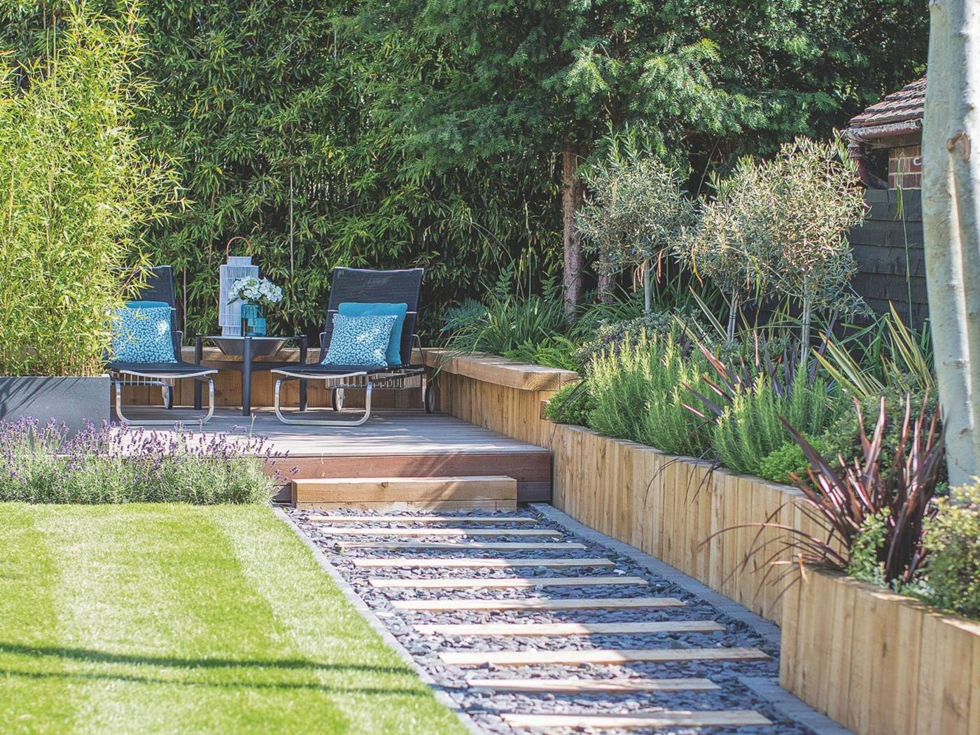 Garden decking with seating and planting