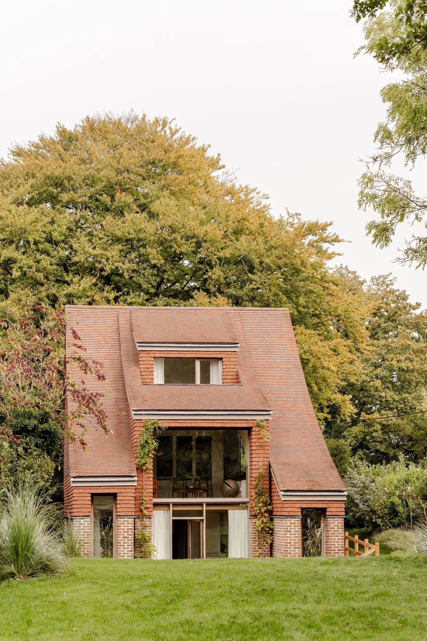 Brick house with tiled roof in the countryside