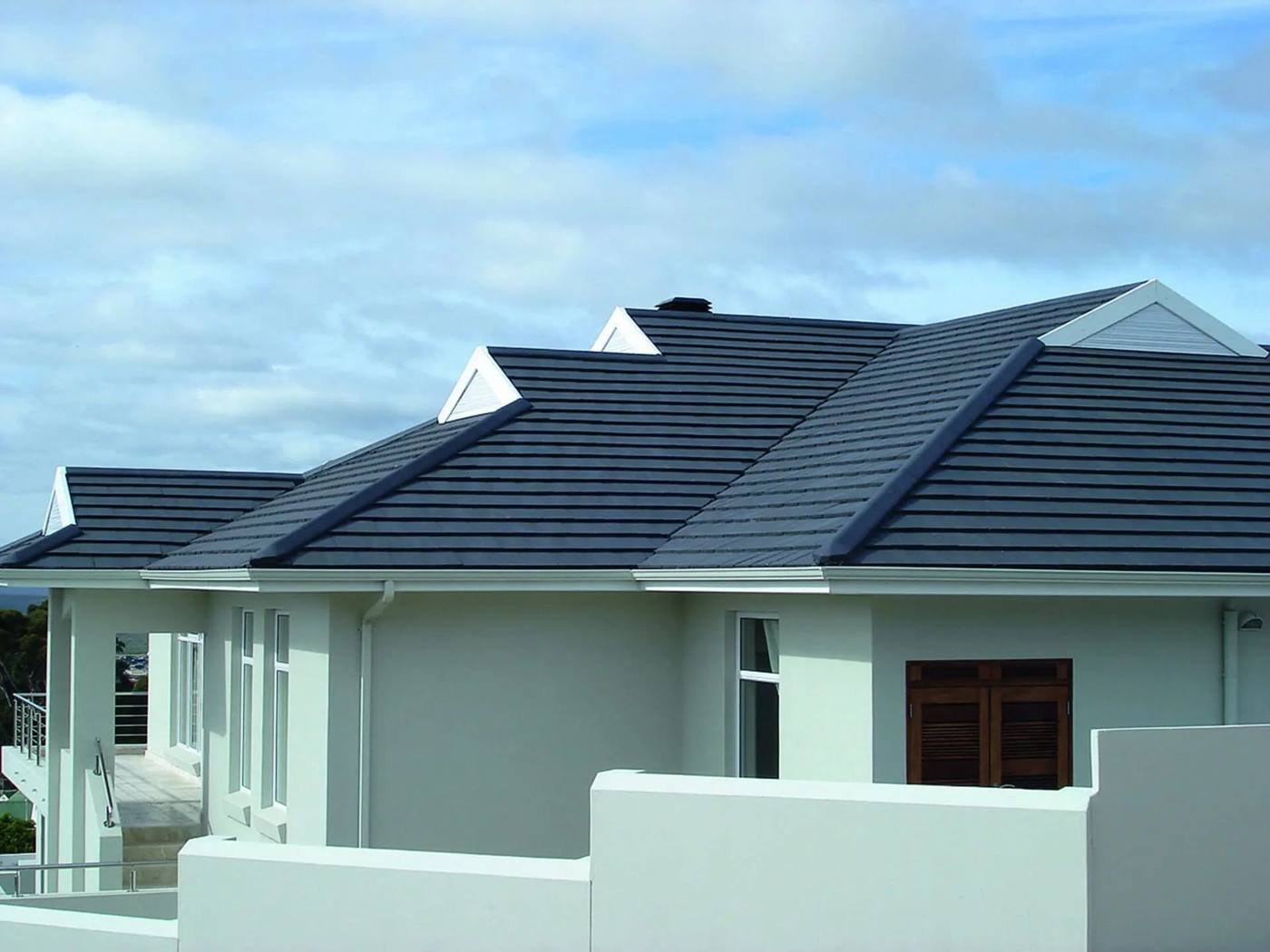 House with smart dark grey tiled roof