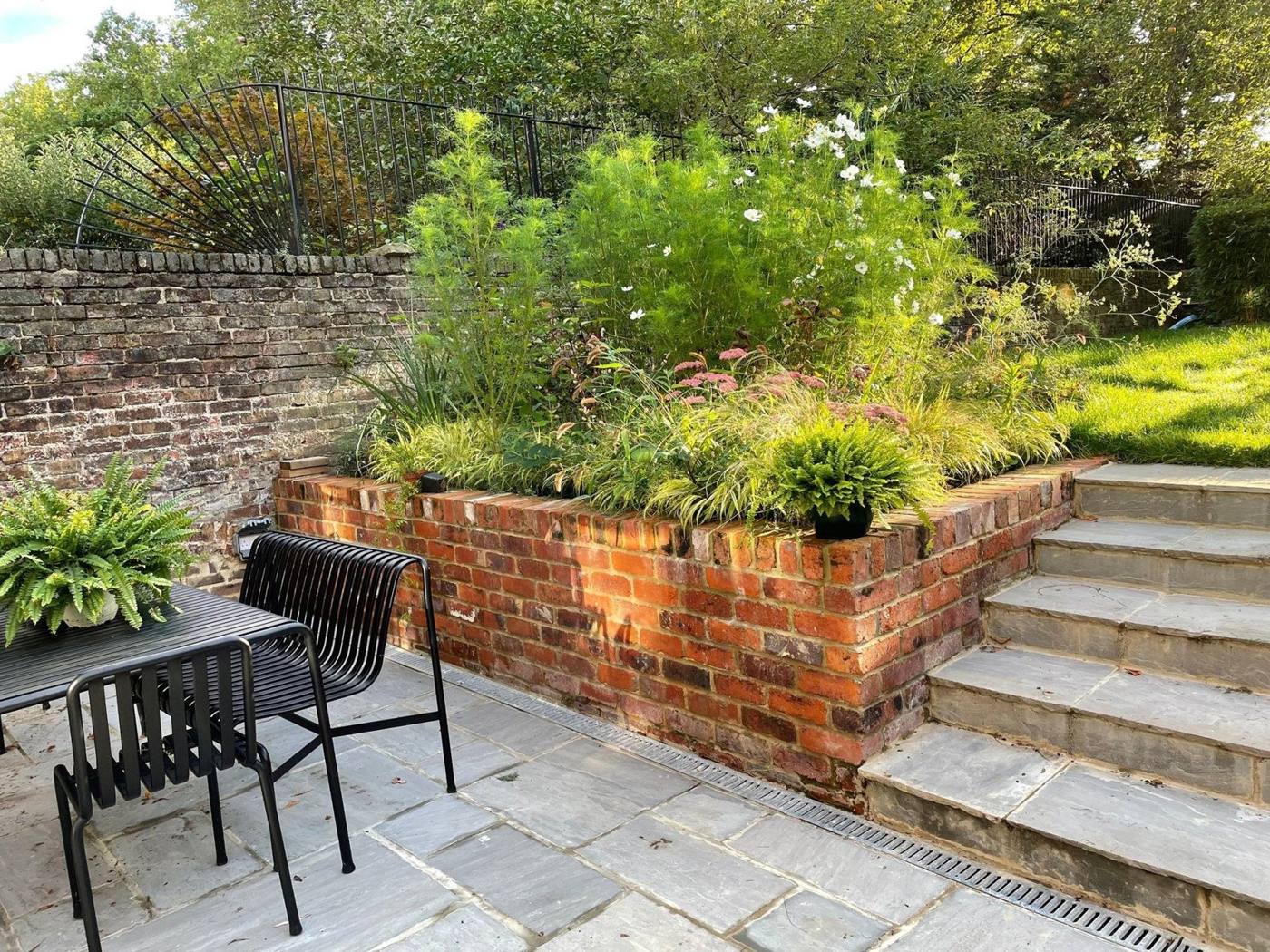 Clean brick garden walls and patio